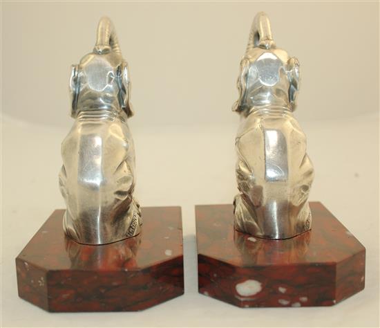 A pair of French Art Deco silvered metal and red marble elephant bookends, 5.5in.